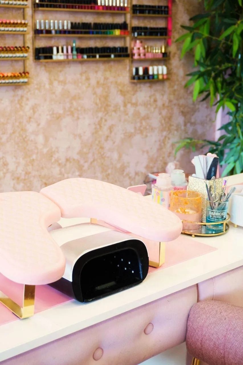A pink manicure station ready for a nail appointment